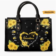 a handbag with sunflowers and the words grandma on it, in black leather