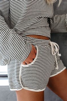 DETAILS SHIPPING&RETURN Size Guide Long Sleeve Top & Shorts100% CottonThe Bring Me Back Stripe Casual Suit is cool enough for the cafe crowd. and comfy enough for cuddling on the couch! These white and black striped cuties are fit with an elastic drawstring waist. Designed with a high quality. thick textured fabrication for the ultimate comfy-cozy feel. Their relaxed fit and side pockets make these a must have â€?especially with the matching top! Shipping & Return Receiving time = Processing tim Casual Relaxed Fit Bottoms For Home, Striped Relaxed Fit Bottoms For Lounging, Casual Vertical Stripes Bottoms For Loungewear, Casual Striped Lounging Bottoms, Casual Striped Bottoms For Lounging, Casual Loungewear Bottoms With Contrast Stripes, Casual Striped Bottoms For Loungewear, Short Wrap Skirt, Bring Me Back