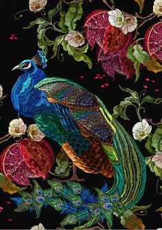 a peacock and pomegranates on a black background