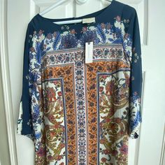 Never Worn Floral Print 3/4 Length Sleeve Dress. 100% Silk With Liner. Flattering Fit For Any Body Type. Single Button Closure In Back. Blue Printed Dress With 3/4 Sleeve, Elegant Long Sleeve Printed Tunic, Dresses Floral, Dress 100, Floral Print Dress, Body Types, Sleeve Dress, Length Sleeve, Colorful Dresses