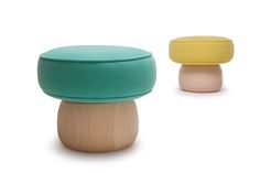 two different colored stools sitting next to each other