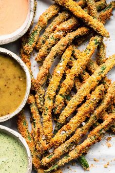 green bean fries with dipping sauces on the side