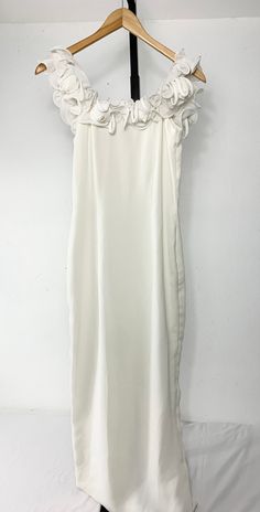 Komlier Dress Size Small Color: white Slits on the bottom bag 9v JN Spring Knee-length Midi Dress With Split Design, Spring Midi Dress With Split Design, Spring Midi Dress With Split Design For Date Night, Casual Midi Dress With Split Design For Spring, Casual Spring Midi Dress With Split Design, White Midi Dress With Side Slits, White Evening Dress With Split Design, White Midi Dress With Side Slits For Evening, Elegant Lined Midi Dress For Daytime