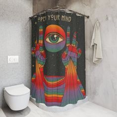 a colorful shower curtain with an image of a person's eye on it and the words, open your mind