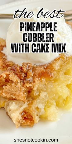 Pineapple cobbler with cake mix on a white plate.