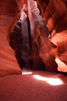 a narrow slot in the side of a canyon