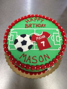 a birthday cake with a soccer themed frosting on it that says happy birthday mason