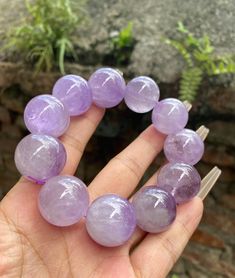 Material:Amethyst Quartz beads size : 21- 20mm quantity: one strand  6mm approx 29 pcs one strands 7mm approx25 pcs one strands 8mm approx 22 pcs one strands 9mm approx 21pcs one strands 10mm approx 19 pcs one strands 11mm approx 18pcs one strands 12mm approx 16 pcs one strands 13mm approx 16 pcs one strands 14mm approx 15 pcs one strands 15mm approx 14pcs one strands 16mm approx 14 pcs one strands 17mm approx 13pcs one strands 18mm approx 13pcs one strands 19mm approx 12pcs one strands 20mm app Hand-strung Amethyst Stretch Bracelet, Purple Gemstone Beads Stretch Bracelet, Lavender Beaded Bracelets With Round Beads As Gift, Amethyst Stretch Bracelet With Round Beads For Gift, Handmade Lavender Stretch Bracelet With Round Beads, Amethyst Beaded Bracelets For Healing, Purple Round Beads Crystal Bracelet For Healing, Spiritual Lavender Round Beads Crystal Bracelet, Lavender Bracelets With 8mm Beads