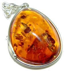 Handmade Unique 925 Sterling Silver pendant with unique one of a kind Amber,  13.20 grams of marvelous handcrafted jewelry design. Only one piece availble ready to ship! It's unique worldwide pendant - simply piece of art in world of fine jewelry. Honey Baltic Amber  .925 Sterling Silver handmade Pendant  PENDANT DETAILS: Weight: 13.20g; Material: Sterling Silver; Main stone: Amber; Dimension: L- 2 1/8, W- 1 1/4, T-  1/2 inch; Inner Bail Diameter: 1/4 inch; Stamp / Mark: 925; Condition: New; Mai Luxury Amber Carnelian Jewelry, Luxury Baltic Amber Pendant Necklace, Luxury Amber Necklaces Fine Jewelry, Luxury Artisan Amber Jewelry, Luxury Amber Necklaces With Stones, Artistic Sterling Silver Necklace With Polished Finish, Unique Amber Sterling Silver Jewelry, Artistic 925 Stamped Jewelry For Gifts, Artistic 925 Stamped Jewelry As Gift