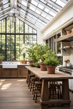 Modern farmhouse kitchen design with skylights, overhead storage and apron sink Greenhouse Kitchen, Conservatory Kitchen, Kitchen Magic, Sunrooms, Bloxburg House Ideas, Farmhouse Style Kitchen, Bloxburg House, Rustic Kitchen