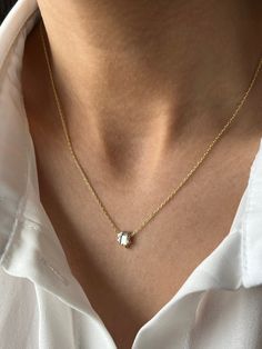 Clover necklace to give you all the Irish luck you might need Get this beautiful minimalist jewelry made with the quality of perfect elements✨ You can choose 925K Sterling Silver with the options of Gold, Rose Gold or White Gold colors High quality jewelry for everyone ❤️  Details * 925K Sterling Silver → 14K Gold, Rose Gold or White Gold plated * Chain length is 18 inches / 45 cm * Time is everything! You will receive your package as soon as possible 🚚  * We care about the quality of metal to make sure it will last for a long time * We use enamel technique to color the jewelry and high quality zircons only * There can be tiny differences on each item. Color changes and shade differences of the stones and enamel is possible since each jewelry piece is unique and special * That beautiful p Minimalist 14k Gold Wedding Birthstone Necklace, Minimalist 14k Gold Birthstone Necklace For Wedding, Minimalist Diamond Cut Pendant Necklace, Simple 14k Gold Necklaces, Minimalist White Charm Necklace For Anniversary, White Gold Birthstone Necklace With Delicate Chain, Simple 14k Gold Necklace For Anniversary, Minimalist Yellow Gold Birthstone Necklace For Wedding, Minimalist White Gold Solitaire Necklace