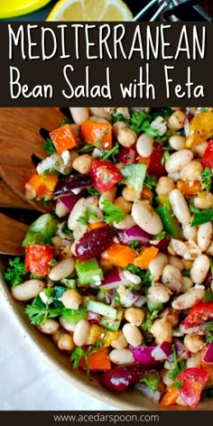 a salad with beans, carrots and other vegetables