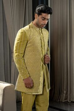 Gold, yellow jodhpuri jacket with thread, zardozi, sequin embroidery in floral pattern. Paired with sherwani and narrow pant. - Aza Fashions Yellow Kurta For Eid Reception, Festive Yellow Kurta For Reception, Yellow Designer Wear Sherwani Straight Kurta, Festive Yellow Nehru Jacket With Resham Embroidery, Yellow Dabka Sherwani For Transitional Season, Designer Yellow Sherwani For Eid, Yellow Bollywood Sherwani, Yellow Sherwani With Traditional Drape, Yellow Sherwani With Cutdana In Straight Kurta Style