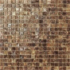 a close up view of a brown tile wall