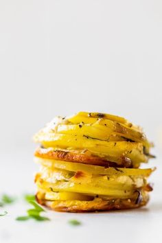 a stack of food sitting on top of a white table