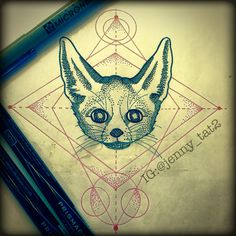 a drawing of a cat with geometric shapes on it's face and two pencils next to it