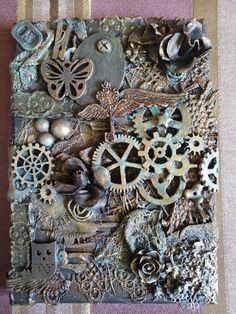 a close up of a piece of art made out of assorted metal parts and objects