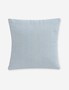 a blue and white striped pillow on a white background