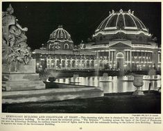 an old black and white photo of a building at night