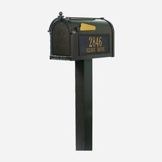 a black mailbox with the number twenty four on it's front and side