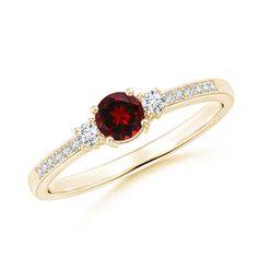 A prong set round garnet at the center radiates unmatched beauty. Two glittering white diamonds enhance the center stone while equally sparkling diamond accents embellish the shank for added beauty. Designed in 14K Yellow Gold, this elegant garnet and diamond three stone ring will perfectly symbolize your beautiful past, present and future. Elegant Red Three-stone Diamond Ring, Elegant Red Three Stone Diamond Ring, Elegant Three-stone Red Diamond Ring, Elegant Three Stone Red Diamond Ring, Diamond Three Stone Ring, Garnet And Diamond Ring, Ruby And Diamond Ring, Three Stone Ring, Three Stone Rings