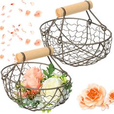 two metal baskets with flowers in them next to each other on a white background,