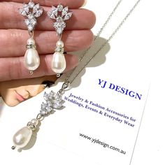 "A set of pearl drop bridal jewelry set with marquise earrings and teardrop necklace, made of sparkly cubic zirconia and swarovski pearls in silver rhodium plated tarnish-resistant base. Earrings are about 1 3/8\" (3.6cm). Pendant is about 1 3/4\" (4.5cm) with bail. Chain length can be added with a 2\" extender chain. View matching pieces or similar designs at https://etsy.me/2uIu6QL View designs with marquise shapes at https://etsy.me/2flzzGg View all necklace and earrings sets at https://etsy. Wedding Jewelry Set With Diamond Accents In Sterling Silver, Classic Sterling Silver Jewelry Sets For Wedding, Wedding Jewelry Sets In Diamond White Sterling Silver, Diamond White Sterling Silver Jewelry Sets For Wedding, Sterling Silver Jewelry Sets For Wedding In Diamond White, Art Deco Dangle Jewelry For Weddings, Classic Wedding Jewelry Sets With Matching Earrings, Art Deco Silver Jewelry For Wedding, Art Deco Silver Wedding Jewelry