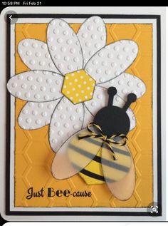 a card with a bee and flower on it