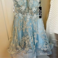 Rare Jvn By Jovani Beautiful Short Light Blue Dress Very Shiny , You Will Be A Star Among Everyone In This Dress ! Blue Lace Mini Dress For Homecoming, Blue Lace Dress For Homecoming, Short Light Blue Dress, Blue Pearl Dress, Jovani Homecoming Dresses, Purple Formal Dress, Mini Gown, Fitted Party Dress, White Satin Dress