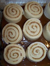 there are many cinnamon rolls in the pan