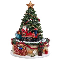 a christmas tree with santa claus on top and train around it's base in front of a white background