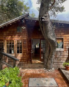 a house with a tree in front of it