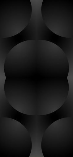 an abstract black and white background with oval shapes in the shape of circles on top of each other