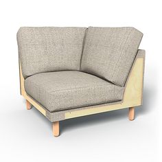 a gray couch sitting on top of a wooden frame