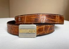 Marking is illegible, Total belt length: 110 cm / 43" Belt length (when it is fastened) at longest position (last hole) : 103 cm / 40" Length at shortest position (first hole) : 90 cm / 35" Width: 3 cm / 1.2" Good vintage used condition  See photos for best details You can see various belts in our shop: https://www.etsy.com/shop/AntiqueArchives?ref=seller-platform-mcnav§ion_id=27028379 I ship internationally registered airmail with tracking number from Lithuania Please, feel free to contact us i Belt Length, Suspender Belt, Lithuania, Air Mail, Suspenders, Leather Belt, Tracking Number, Belts, Silver Gold