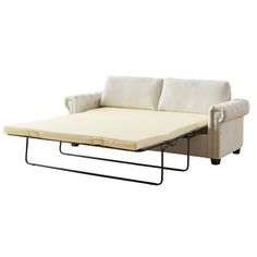 a couch with a mattress attached to it's backrest and two pillows on top