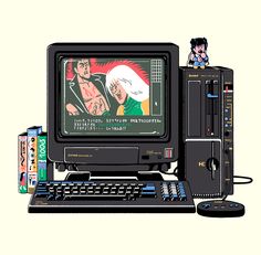 an old computer with a cartoon character on the screen and several other items around it