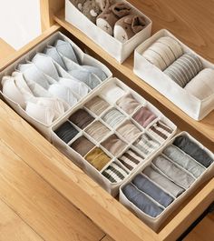 the drawers are filled with folded towels and other things to use as storage for socks