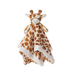 a stuffed giraffe is wrapped in a blanket