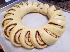 a bundt cake sitting on top of a pan covered in icing