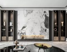 a living room with marble walls and furniture