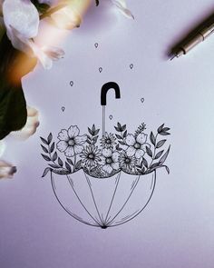 a drawing of an umbrella with flowers on it