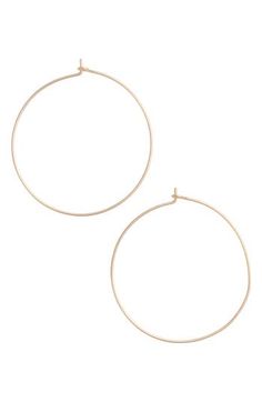 Dress up your everyday look with these delicate hoop earrings featuring a slim silhouette. 1 3/4" diameter Snap-post closure 14k-gold or sterling silver Made in the USA Chic Small Hoop Rose Gold Earrings, Chic Rose Gold Hoop Earrings, Chic Rose Gold Round Hoop Earrings, Adjustable Rose Gold Hoop Earrings, Simple Rose Gold Hoop Earrings, Earrings In Gold, Made In The Usa, Everyday Look, Jewelry Earrings