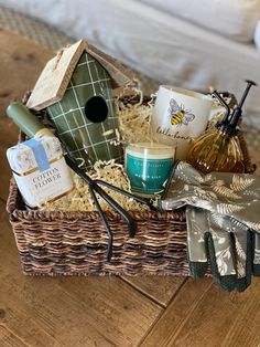 a wicker basket filled with items on top of a wooden floor