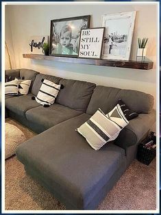 Looking to maximize your small space? Check out these 10 stylish apartment couch ideas that are perfect for small spaces. From sleek modern designs to cozy sectionals, find the perfect couch to fit your apartment's layout and style. Whether you're looking for a pop of color or a neutral piece to blend in, these couches are sure to elevate your apartment decor. Living Room Decor Shelves Over Couch, Over The Couch Shelves, Long Shelves Over Couch, Above Couch Ideas Living Rooms, Long Floating Shelf Over Couch, Farmhouse Living Room Behind Couch, Decor Above Large Couch, Decorating Above Sectional Couch, Above The Couch Picture Ideas