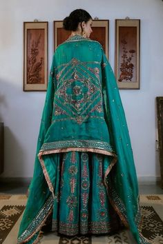 Teal green attached cancan lehenga with sequin, thread, cutdana, bead embroidery in floral stripe pattern. Paired with sweetheart neck embroidered padded blouse and fringe lace bordered dupatta. - Aza Fashions Green Chinon Sets With Mirror Work, Green Dola Silk Sharara For Reception, Green Sharara With Mirror Work And Traditional Drape, Pista Green Raw Silk Lehenga With Dabka Work, Green Raw Silk Choli For Wedding, Traditional Green Gown With Zari Work, Green Bollywood Raw Silk Gown, Green Salwar Kameez With Mirror Work For Reception, Green Kundan Sets For Reception