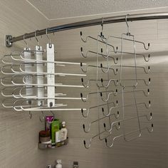 there is a shower rack with many items on it