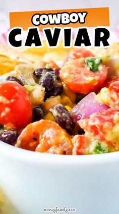 this cowboy caviar salad is loaded with tomatoes, black beans, and corn