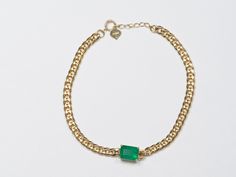 ♥ A 14K gold Miami Cuban link chain bracelet with a stunning Zambian emerald pendant in the center ♥ The emerald measures 8mm in width, 6mm in length, and sits 5mm thick ♥ The bracelet is 6" in length with an 1" extension chain for adjustment ♥ The Miami Cuban link chain is 3.5mm wide ♥ Material: 14K gold ♥ Gemstones: Zambian emerald, 1.7ct ♥ All gemstones used are genuine, earth-mined, and guaranteed conflict-free! Miami Cuban Link, Miami Cuban Link Chain, Miami Cuban, Emerald Bracelet, Zambian Emerald, Emerald Pendant, Cuban Link, Cuban Link Chain, Pave Ring