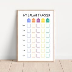 a poster with the words, my salah tracker on it in rainbows and blue